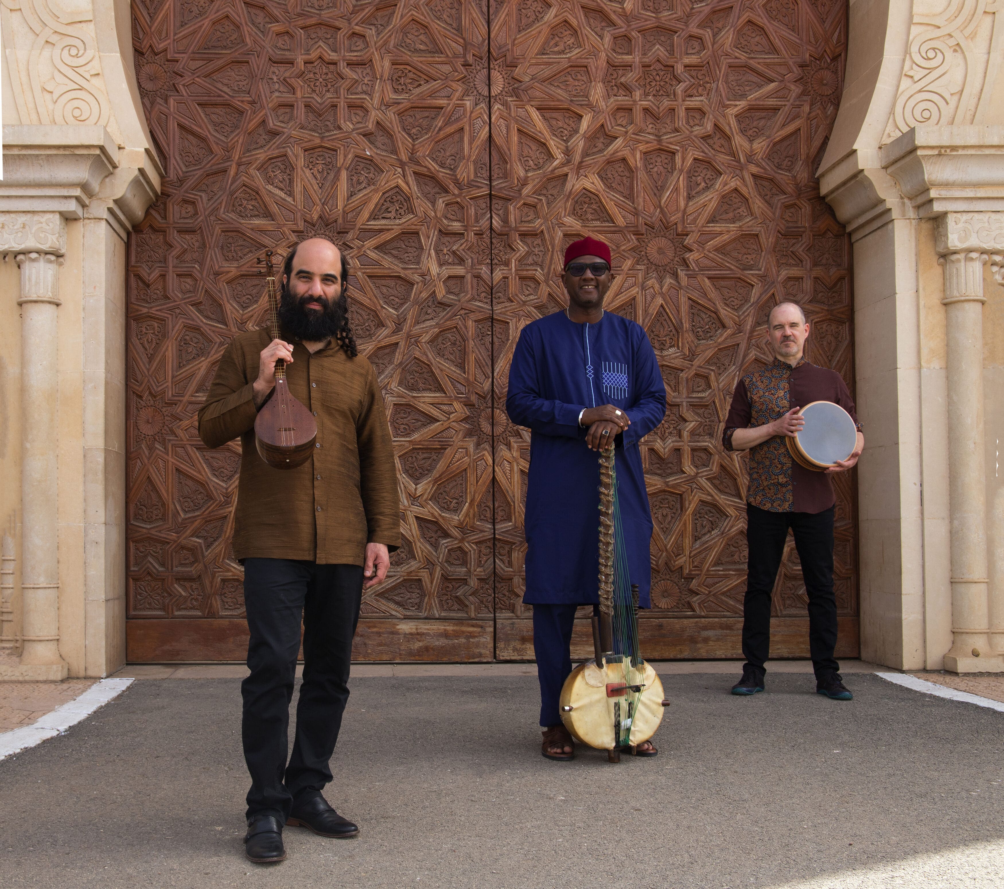 Kiya Tabassian, Ablaye Cissoko and Patrick Graham